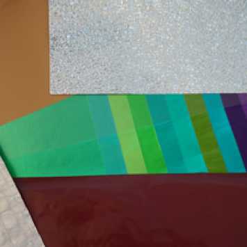 Lacquered and embossed aluminium foils and laminations.